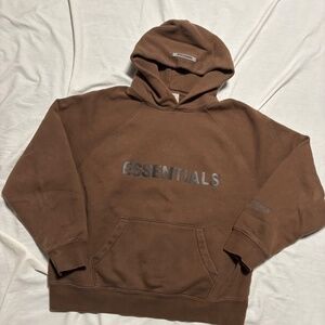 Essentials hoodie in dark brown Features front pocket and hood